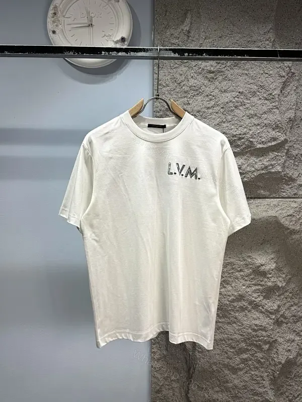 View 1 of Minimalist White Tee with Subtle L.V.M. Logo—Premium Everyday Essential