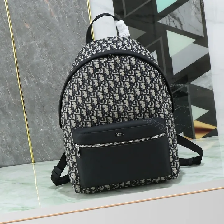 View 1 of Compact Monogram Backpack: Luxe, Modern, Functional Carry