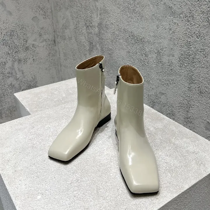 View 1 of Off-White Leather Ankle Boots with Square Toe and Zipper