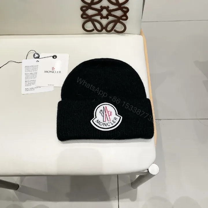 View 1 of Monochrome Knit Beanie: Luxe Logo Warmth, Folded Cuff