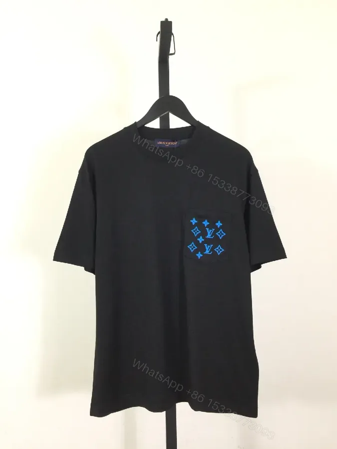 View 1 of Black Cotton Tee with Blue Pocket Embroidery — Luxe Streetwear Essential