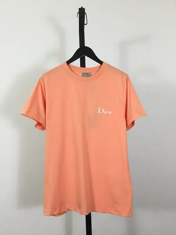 View 1 of Coral Cotton Tee — Minimal Dior Accent, Relaxed Fit, Breathable