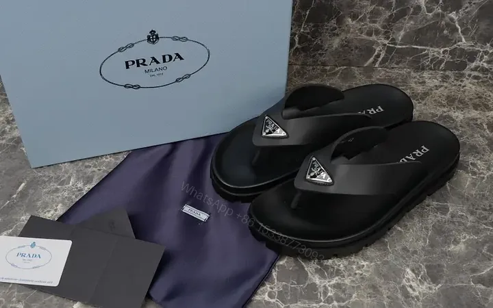 View 1 of Black Leather Flip-Flops Modern Minimalist Prada Slip-On Style Beach Footwear