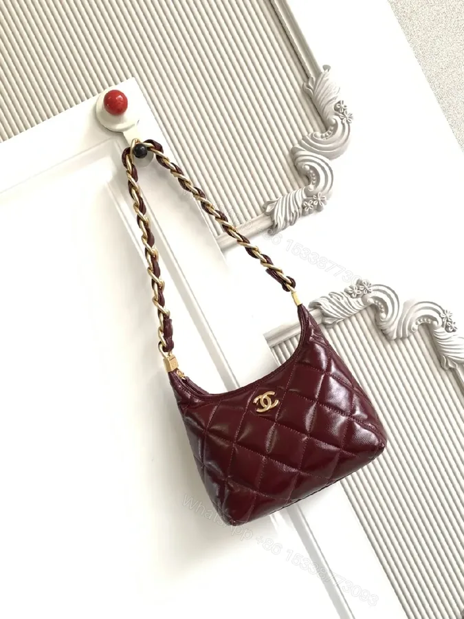 View 1 of Burgundy Quilted Mini Bag with Gold Chain Strap