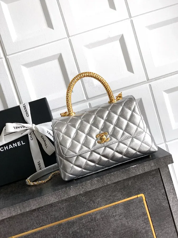 View 1 of Quilted Metallic Handbag: Structured Glamour, All-Day Confidence