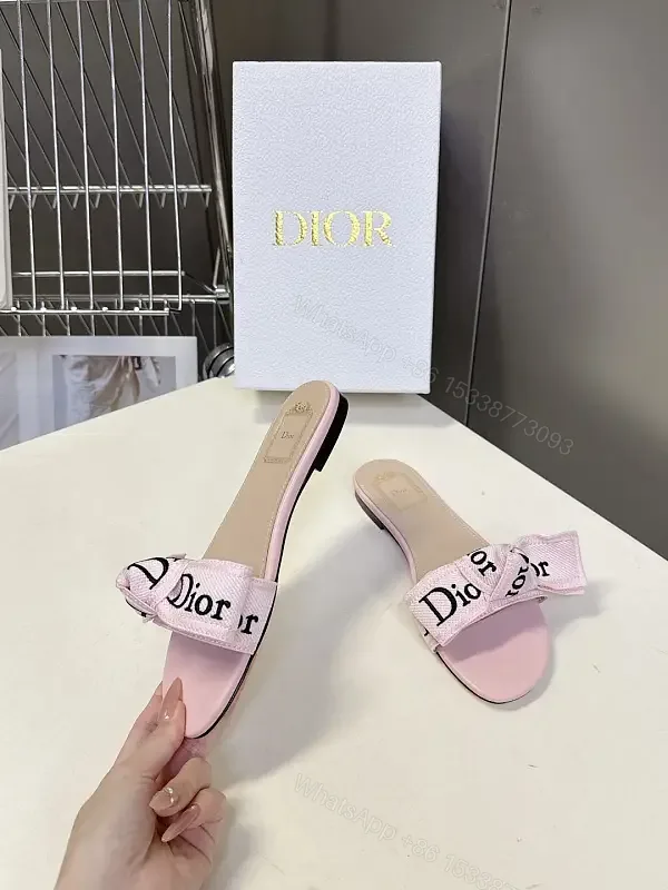 View 1 of Pink Satin Dior-Logo Bow Slip-Ons