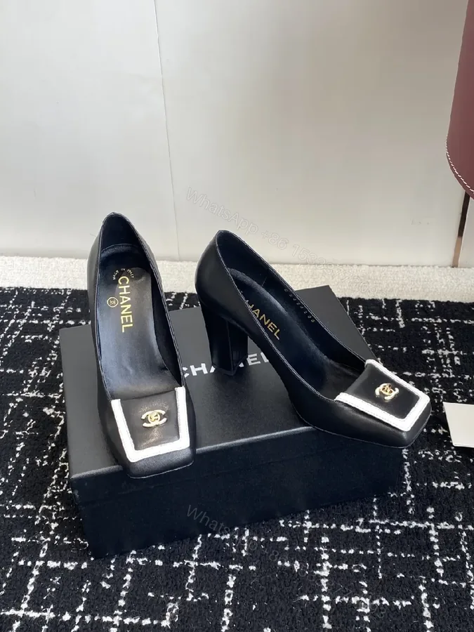 View 1 of Chic Black Leather Heels with White Trim Detail Pumps