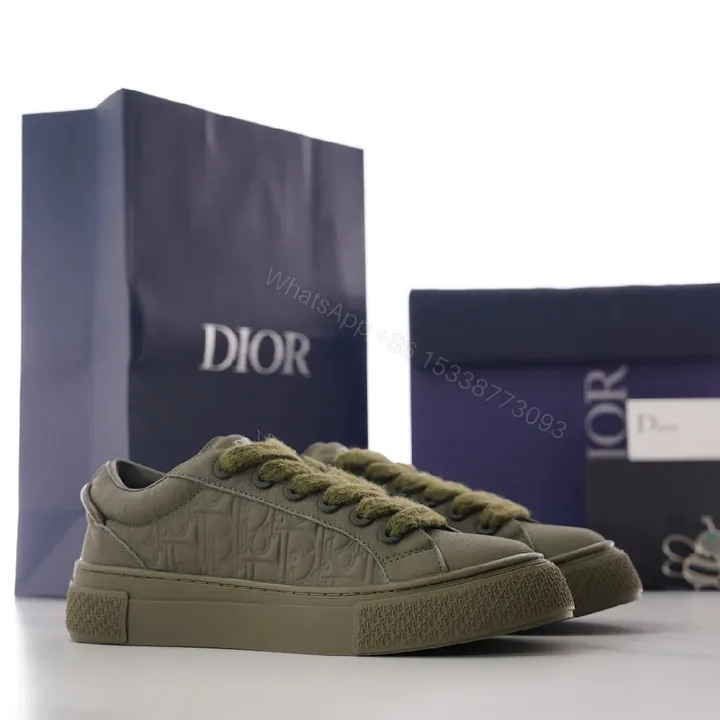 View 1 of Olive Luxe Olive Suede-Leather High-Top Sneaker with Monogram Embossing