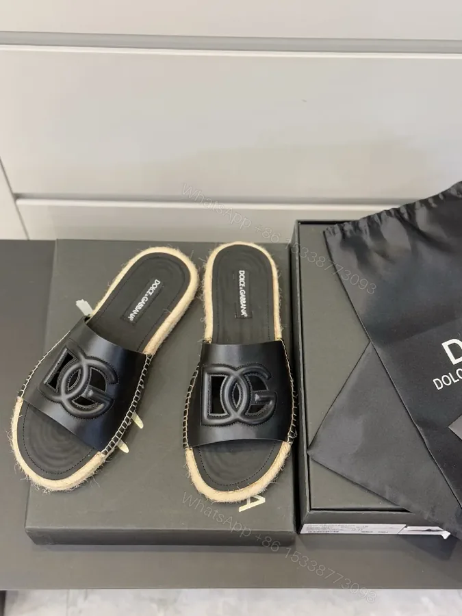 View 1 of Chic Minimalist Leather Sliders with Iconic Monogramed Split-sole Slide