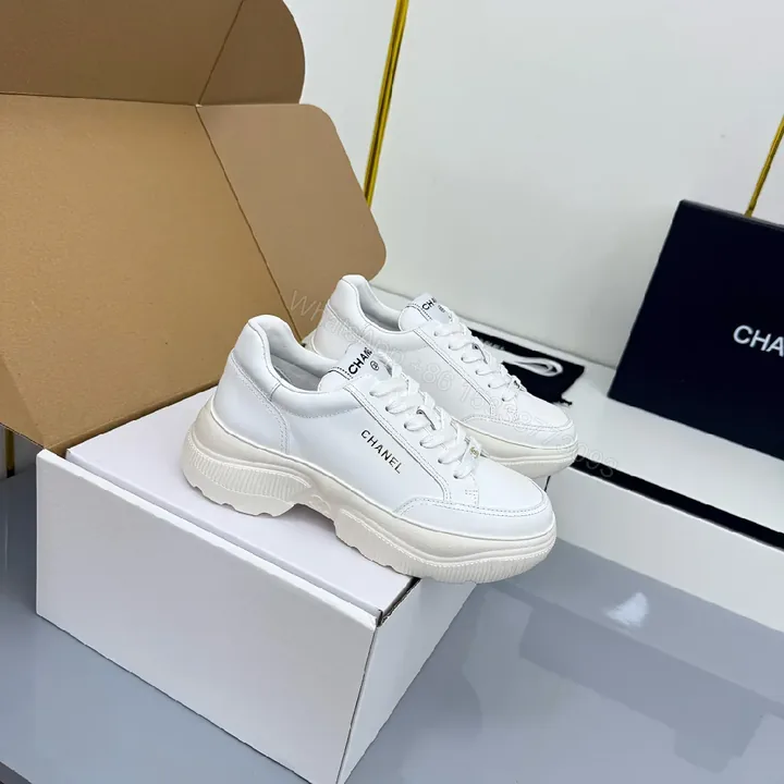 View 1 of White Leather Platform Sneaker with Subtle Chanel-Inspired Detail