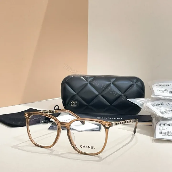View 1 of Soft-Glow Tortoise Frame Eyewear: Luxury Glasses with Gold Detailing