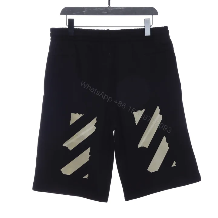 View 1 of Off-White Rubber Strip Printed Shorts