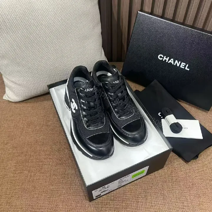 View 1 of Black Leather Low-Top Sneakers, Signature Detailing, Luxury Style