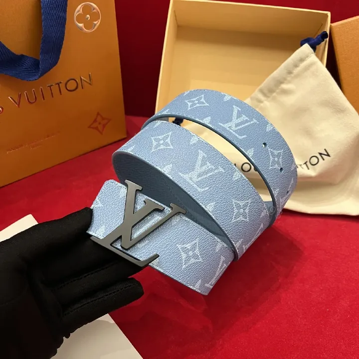 View 1 of Soft-Blue Monogram Belt: Textured Leather, Modern Silhouette, Everyday Luxury