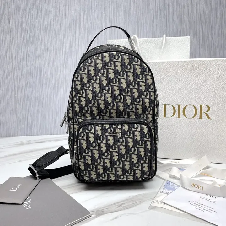 View 1 of Monogram Dior Backpack: Oblique Canvas, Black Leather, Luxe Daily Carry