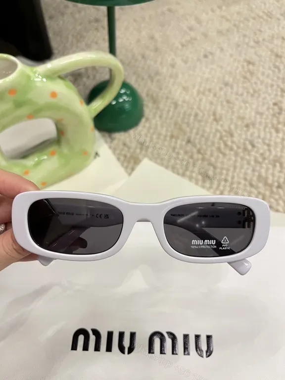 View 1 of Chic White Frames Sunglasses â€“ Modern Minimalist, Polarized UV