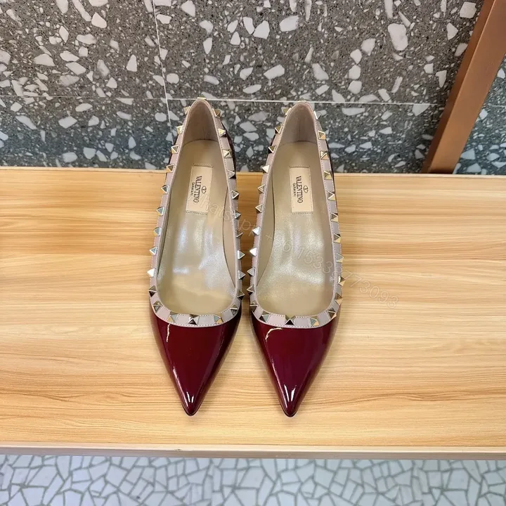View 1 of Valentino Women Burgundy Patent Leather Studded Pumps
