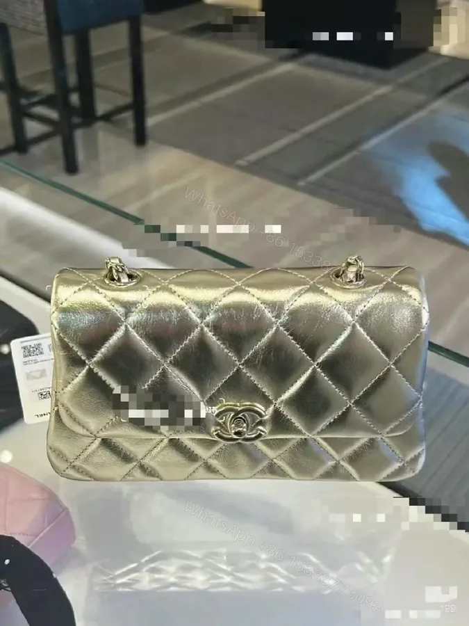 View 1 of Shimmer Quilted Luxe Bag: Metallic Structure & Shine