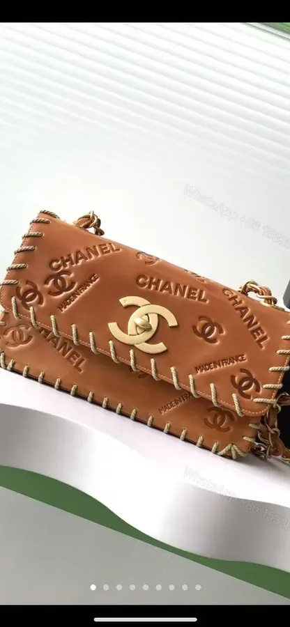 View 1 of Textured Leather Flap Bag with Gold Clasp, Whipstitch Accent, Crossbody Style