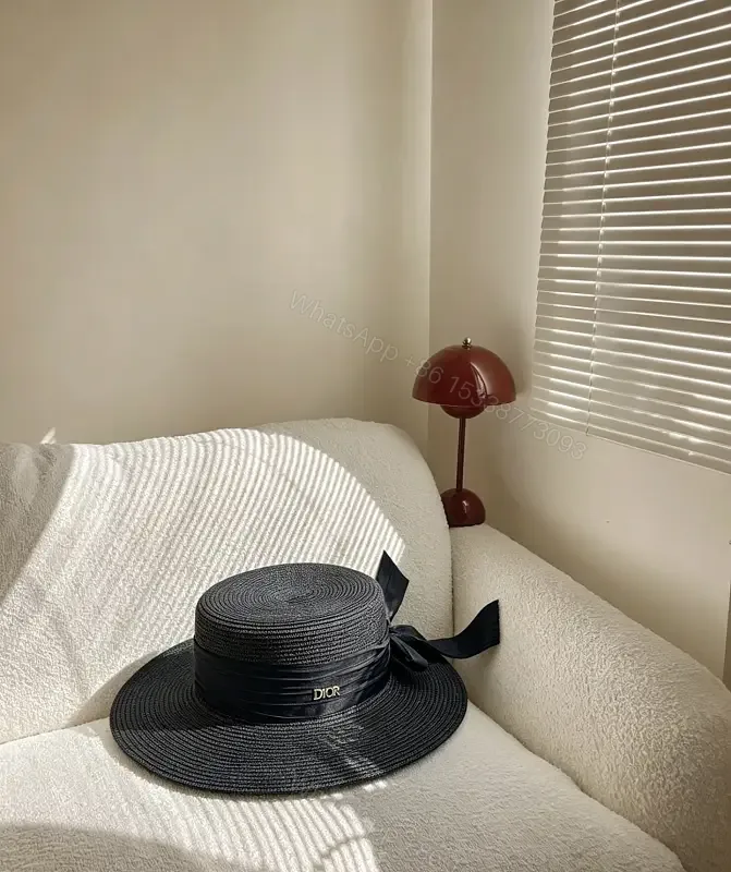 View 1 of Black Straw Hat Wide-Brim Bow Ribbon Dior Charm hat