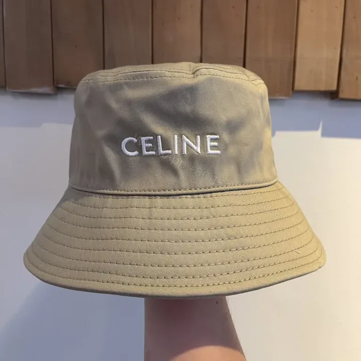 View 1 of Beige Canvas Bucket Hat - Subtle Celine Logo, Luxe Style