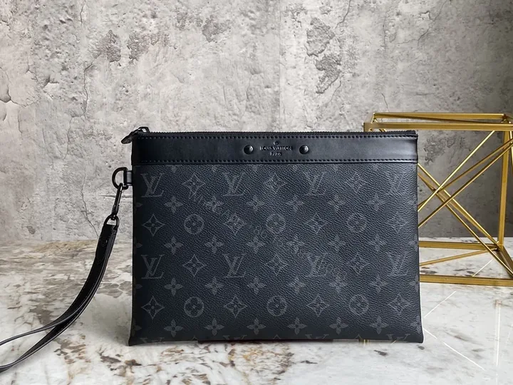 View 1 of Dark Monogram Clutch: Luxe Black Canvas, Leather Trim, Wrist Strap