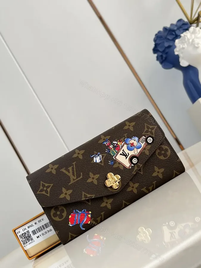 View 1 of Playful Monogram Wallet: Luxe Canvas, Whimsical Patches, Gold-Accent