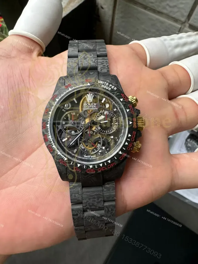 View 1 of Rolex Super Clone Carbon Fiber Daytona Skeleton Red Accents Gold Pushers