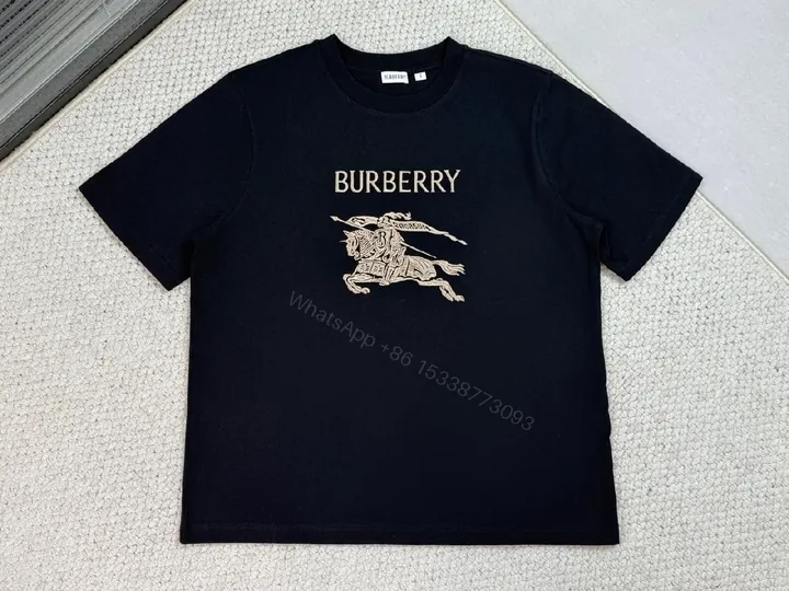 View 1 of [N/A] Bold Navy Cotton Tee with Gold Logo Graphic