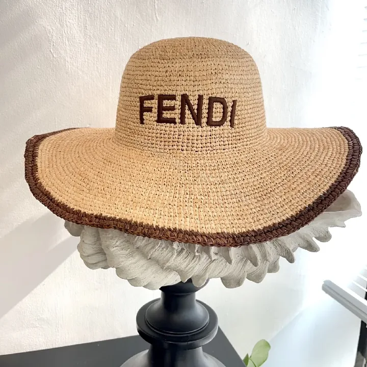 View 1 of Wide-Brim Straw Knit Hat: Bold Couture-Ready Sun Shield