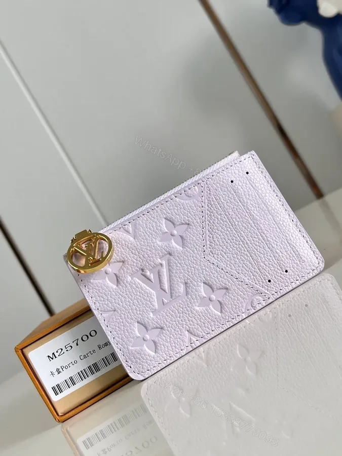 View 1 of Soft Monogram Wallet: Gold LV Charm, Compact Luxury, Leather