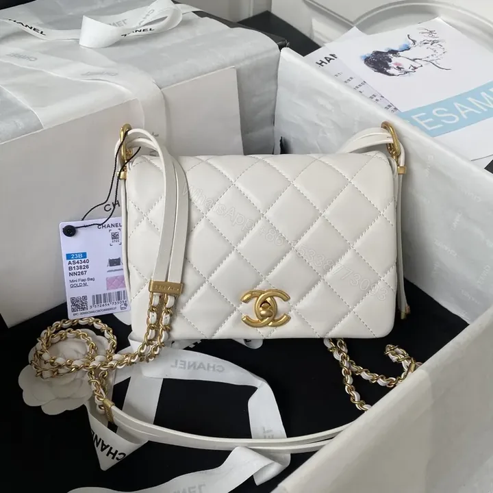 View 1 of Ivory Quilted Leather Flap Bag â€” Luxe Everyday Carry