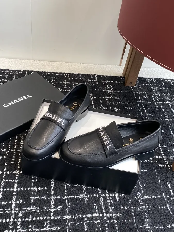 View 1 of Chic Slip-On Loafers: Luxury Leather, Signature Branding
