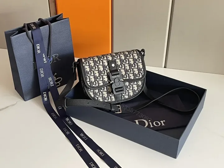 View 1 of Monogram Saddle Bag: Dior Canvas Crossbody Chic