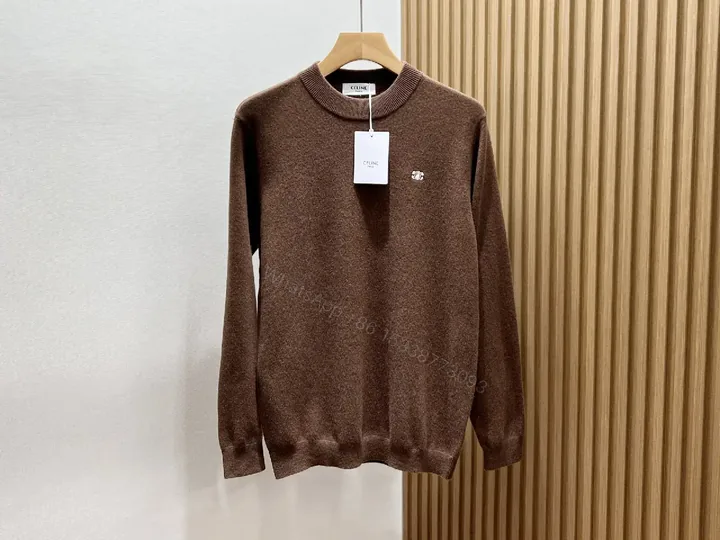 View 1 of Rich Cocoa Knit Sweater in Marled Texture with Crest Embroidery