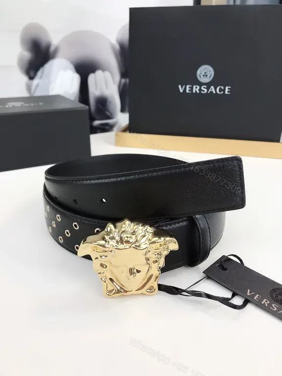 View 1 of Black Leather Belt with Gold Medusa Buckle - Versace Luxury Accessory