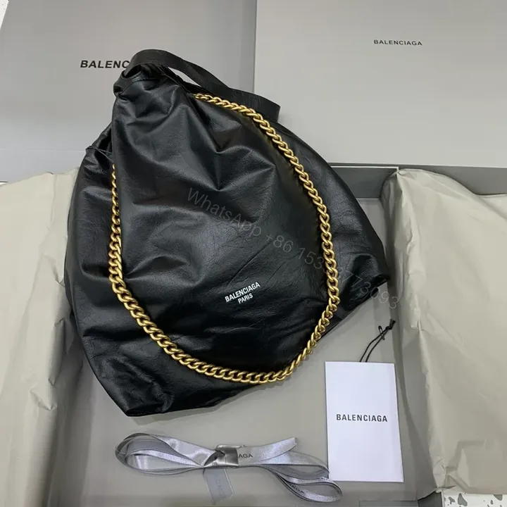 View 1 of Black Leather Balenciaga-Inspired Tote with Gold Chain Handle