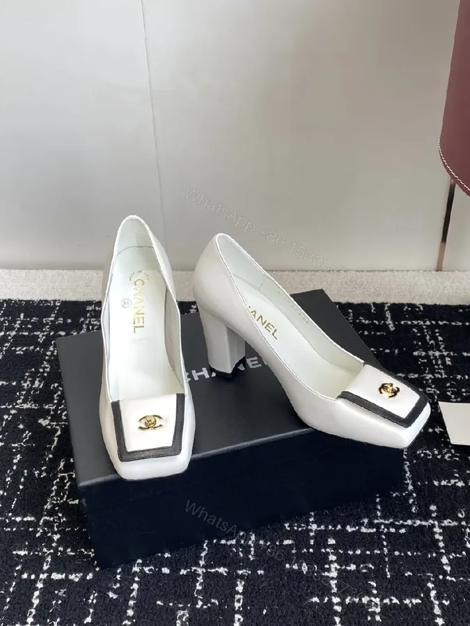 View 1 of White Leather Block-Heel Pumps with Gold Crest Accent