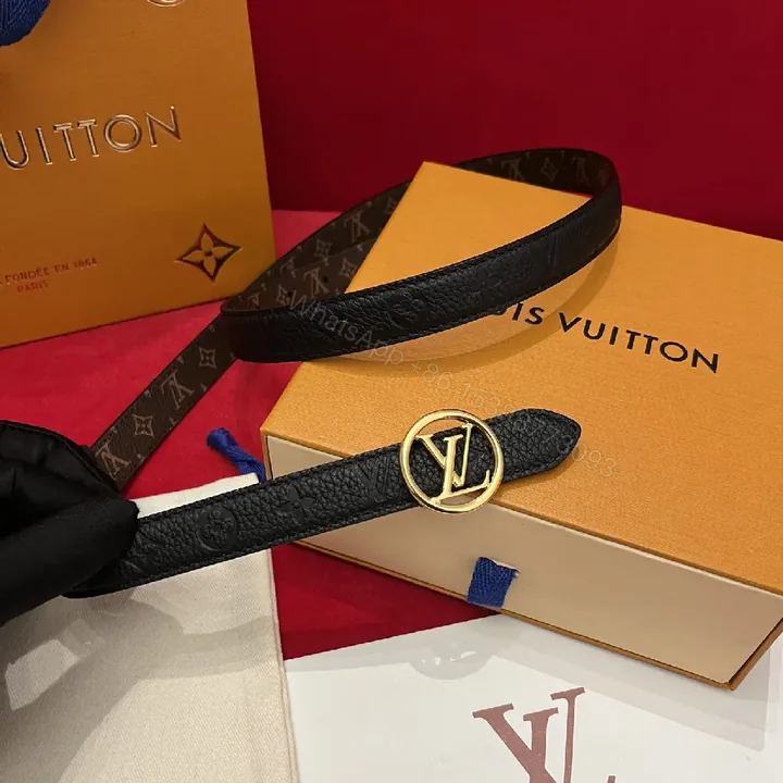 View 1 of Minimalist Black Pebbled Leather Belt with Gold Emblem