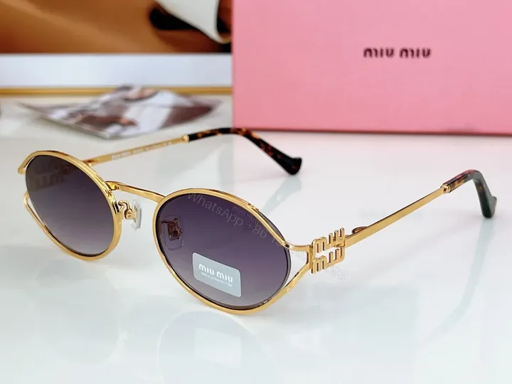 View 1 of Gold Tone Miu Miu Round Sunglasses â€“ Luxe Everyday