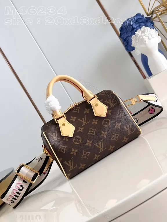 View 1 of Structured Monogram Mini Tote: Compact, All-Season Luxury