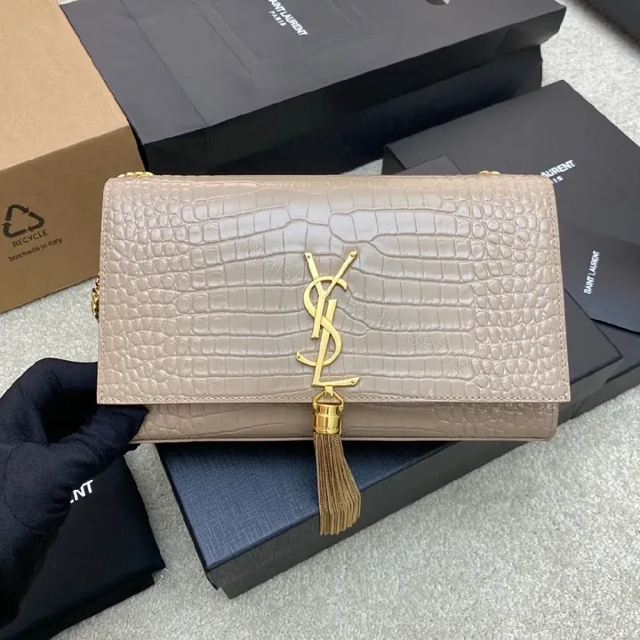 View 1 of Taupe Crocodile-Embossed Clutch with Gold Monogram and Tassel