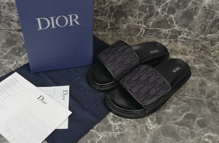 View 1 of Black Mono Slide: Textured Strap Luxury Slides