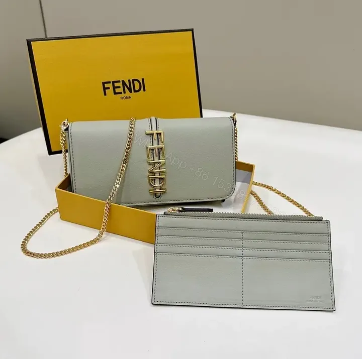 View 1 of Polished Leather Set: Gray & Gold Modern Saddle Bag & Cardholder