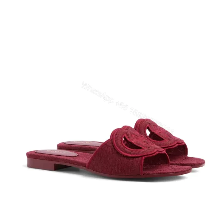 View 1 of GUCCI WOMEN SLIDE SANDAL WITH INTERLOCKING G ROSSO ANCORA RED GG CANVAS ‎790447 9SF00 8549