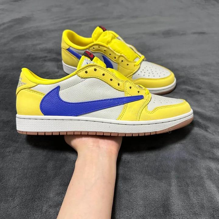 View 1 of Jordan 1 Retro Low OG SP Travis Scott Canary (Women's)