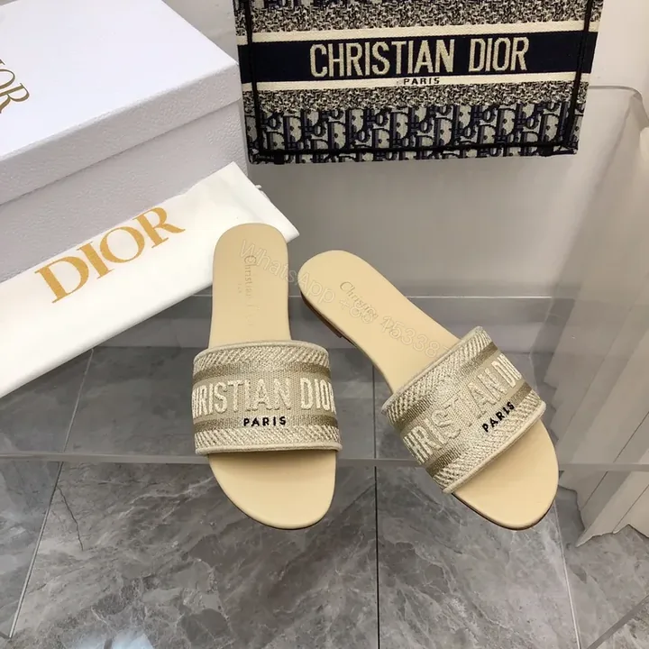 View 1 of Denim-Inspired Dior Slides: Luxe Comfort, Signature Branding