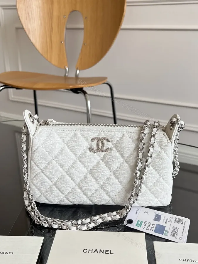View 1 of Quilted White Mini Bag with Silver Chain - Luxe Compact Style