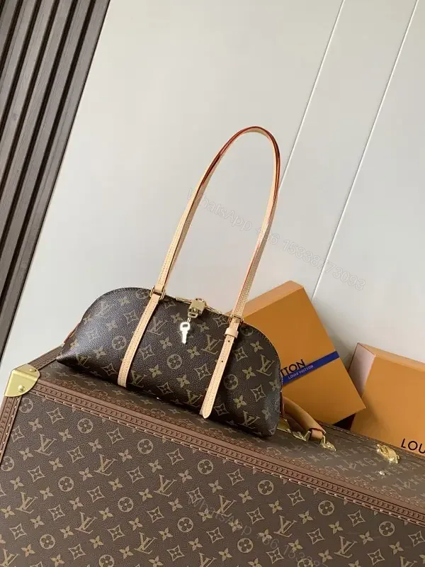 View 1 of Compact Monogram LV Handbag & Case Set – Luxury Travel Ready