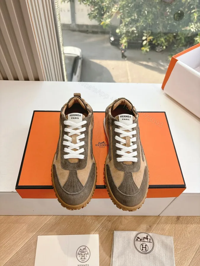 View 1 of Hermes Women Brown Suede Sneakers
